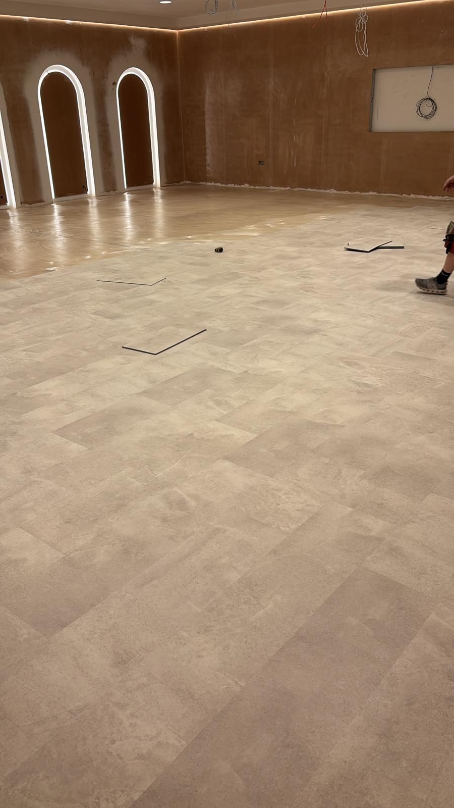 Herringbone studio flooring being laid at Reform and Revive