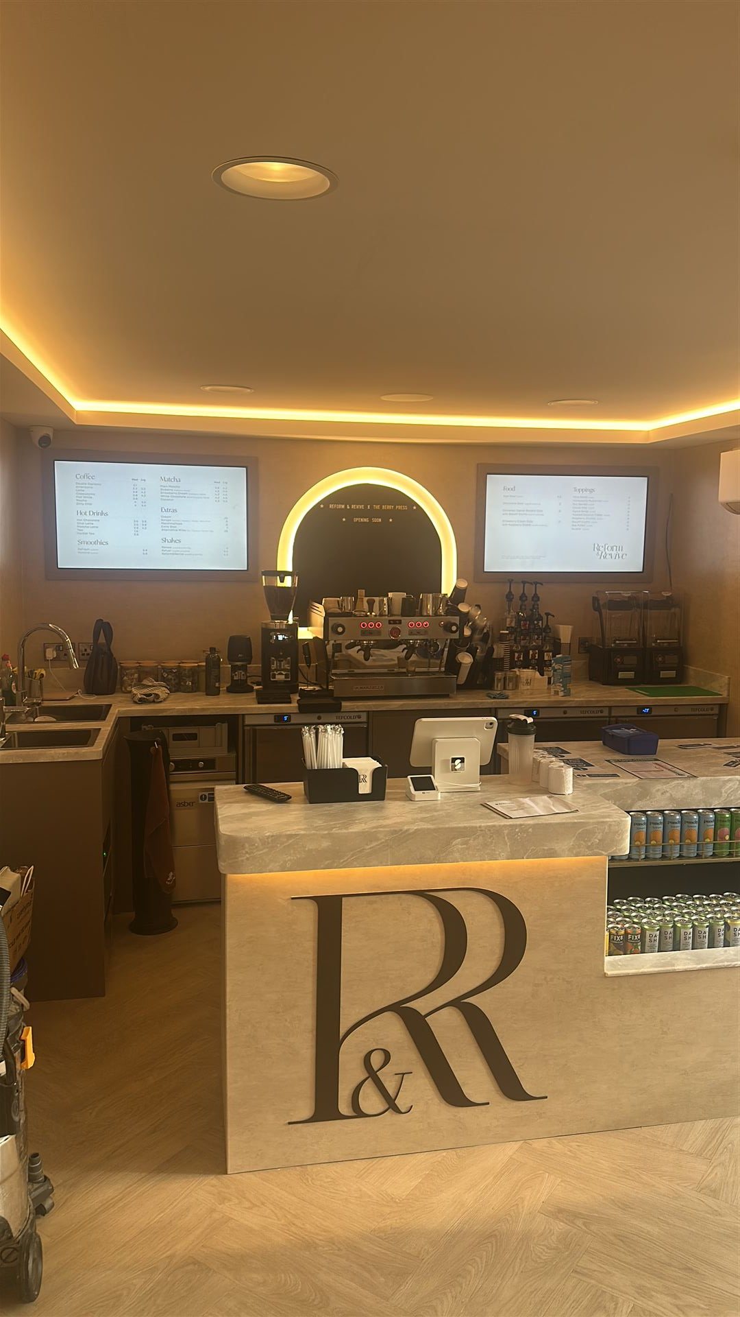 Cafe counter fitted out with espresso machine ahead of opening