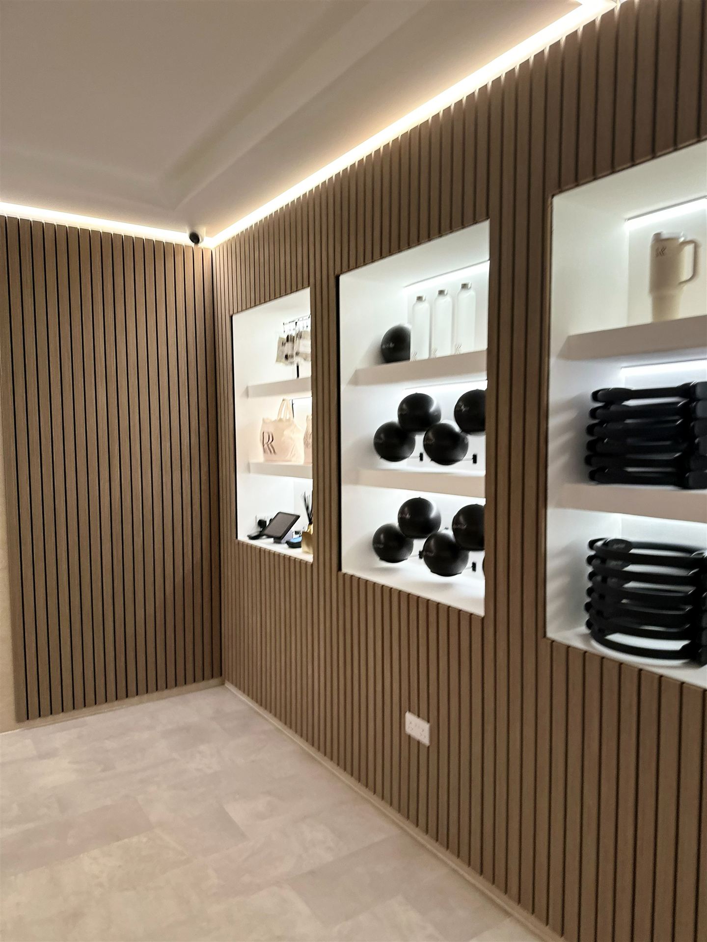 Retail shelving with branded merchandise and equipment